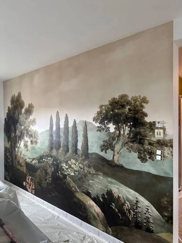 Pose de papier peint panoramique paysage sur tout un mur